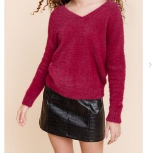 Fuzzy open back knotted sweater